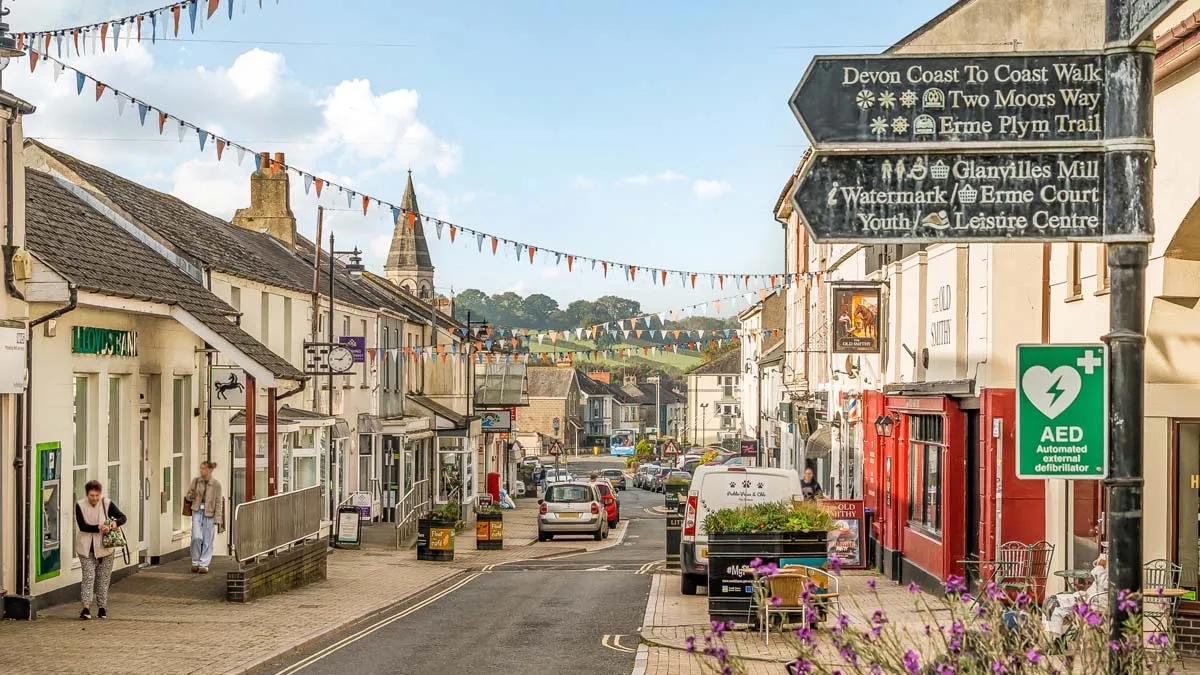 Shops and bunting on the high street in Ivybridge