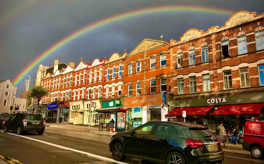 A rainbow over the shops on Finchley High Road