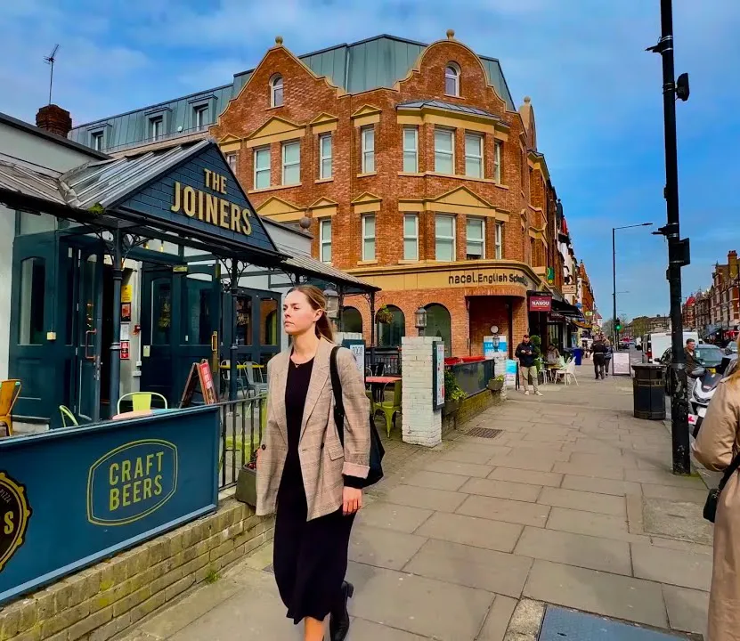 A pub and shopfronts on North Finchley high street
