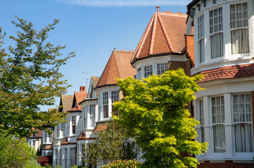 A row of residential houses on a quiet street